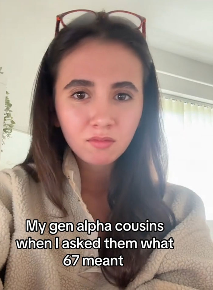 Young woman indoors with text overlay about overused slang words experts say to banish in 2026. Young woman indoors with text overlay about overused slang words experts say to banish in 2026.