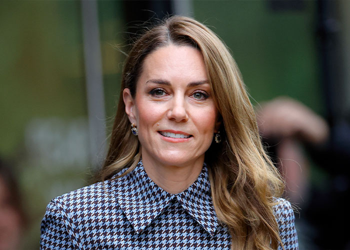 Kate Middleton smiling outdoors, celebrating her 44th birthday with viral Meghan Markle evil stare compilation buzz. Kate Middleton smiling outdoors, celebrating her 44th birthday with viral Meghan Markle evil stare compilation buzz.