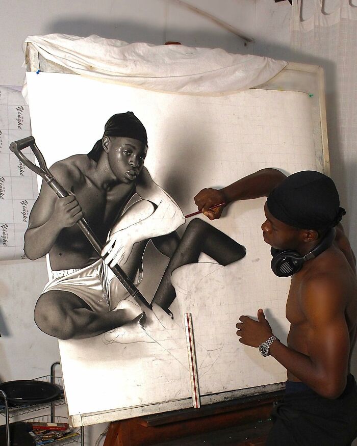 Artist creating a hyperrealistic portrait using pencil, showing behind-the-scenes process of detailed portrait artwork.