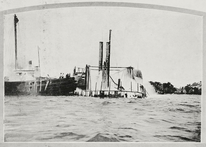 Black and white photo of a partially submerged steamboat, a haunted place with dark secrets in America. Black and white photo of a partially submerged steamboat, a haunted place with dark secrets in America.