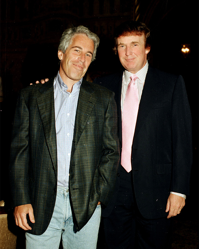 Jeffrey Epstein and Donald Trump posing together at a formal event, wearing jackets and smiling for the camera. Jeffrey Epstein and Donald Trump posing together at a formal event, wearing jackets and smiling for the camera.