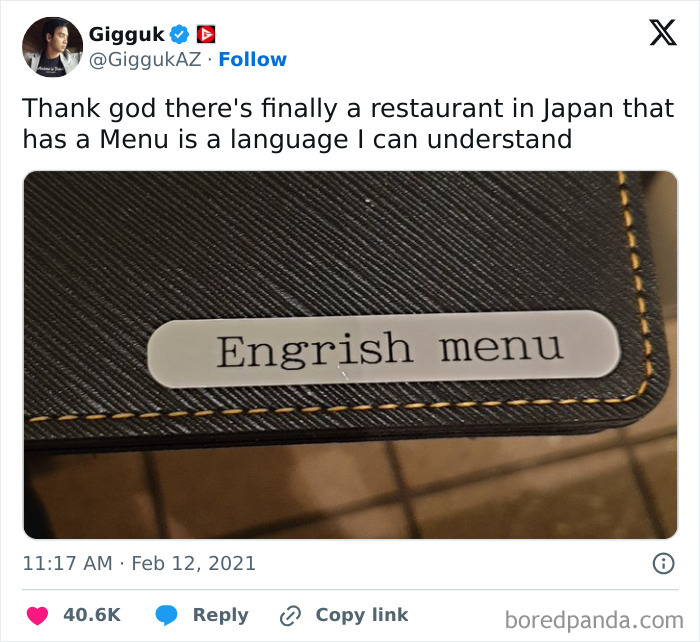 Tweet showing a photo of a restaurant menu in Japan with a humorous Engrish translation error.