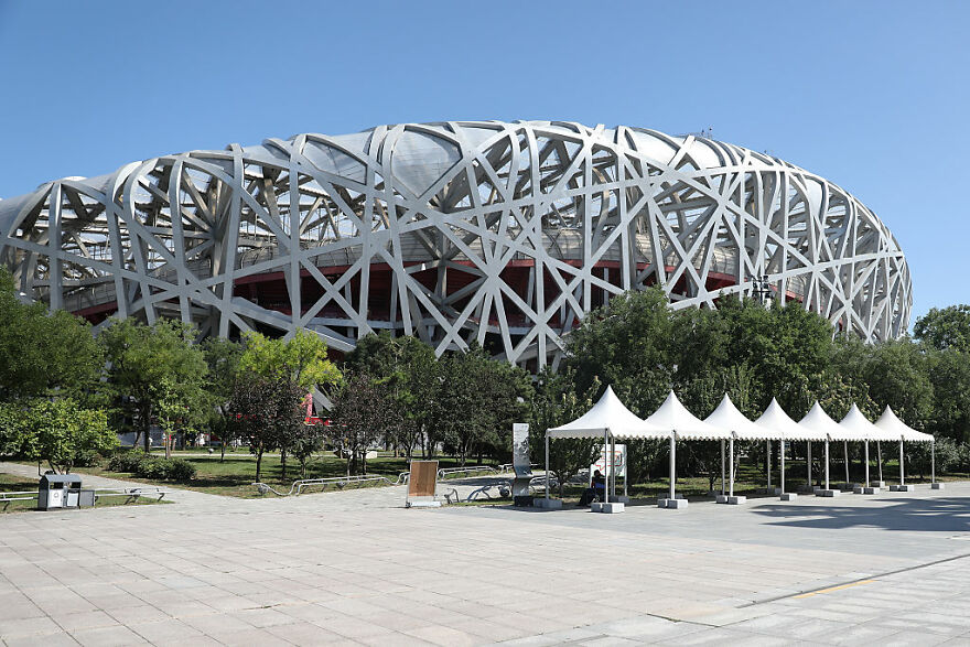 Beijing National Stadium with its bird’s nest-inspired design, a notable biomimicry example in architecture.