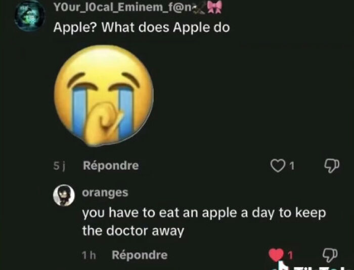 Screenshot of weird and funny TikTok comments discussing what an apple does with crying emoji reaction.