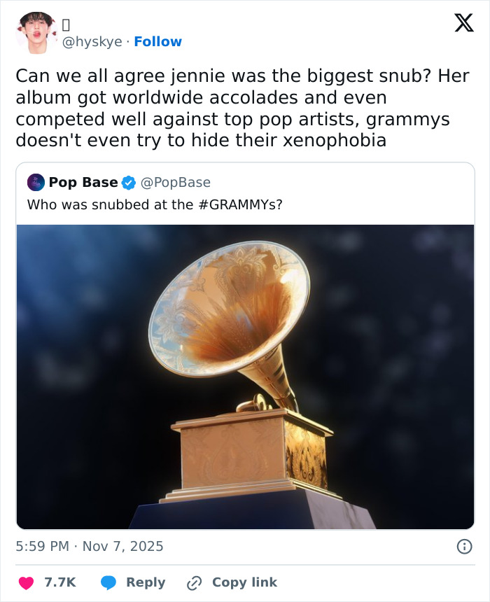 Grammy snubs discussion on social media with an image of a Grammy award trophy against a dark background.