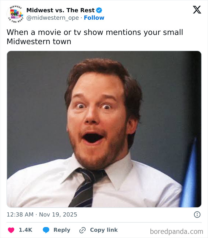 Man in a shirt and tie looking surprised, capturing spot-on Midwest life meme humor about small towns and craving corn.