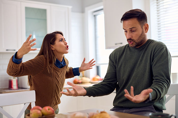 Couple arguing in kitchen after man eats pregnant partner’s craving treat, her frustrated expression and his wild excuse. Couple arguing in kitchen after man eats pregnant partner’s craving treat, her frustrated expression and his wild excuse.