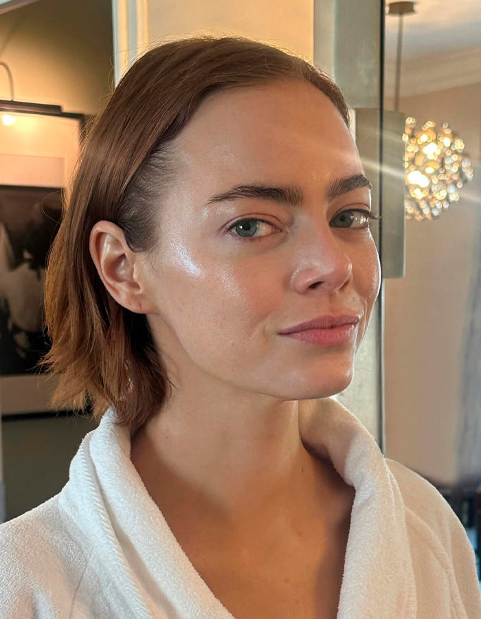 Close-up of woman with glowing skin, showcasing celeb facialist secrets for Golden Globes glow and radiant complexion.