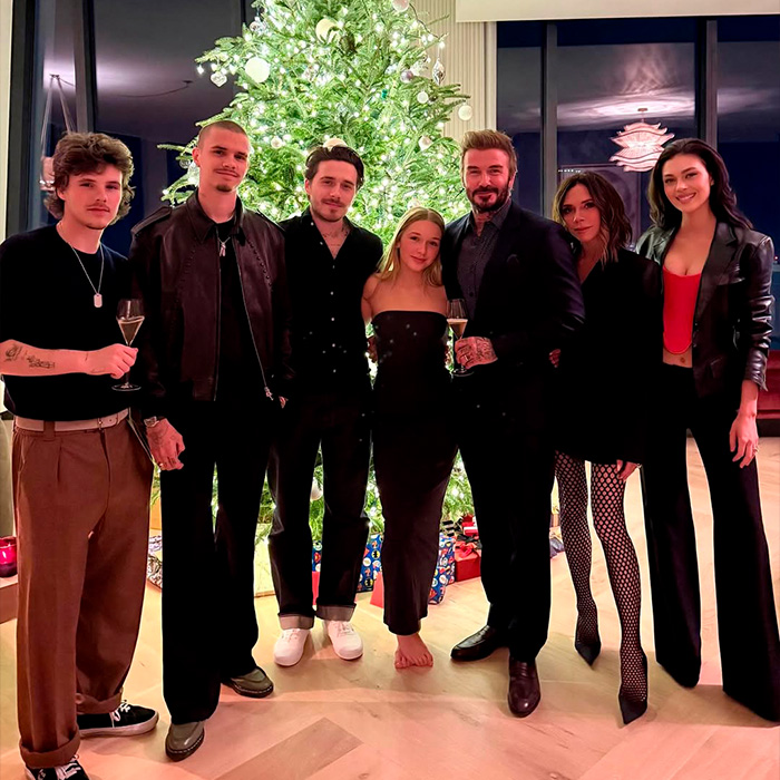 Victoria Beckham and Nicola Peltz posing together at a family gathering during a tense exchange amid their feud.