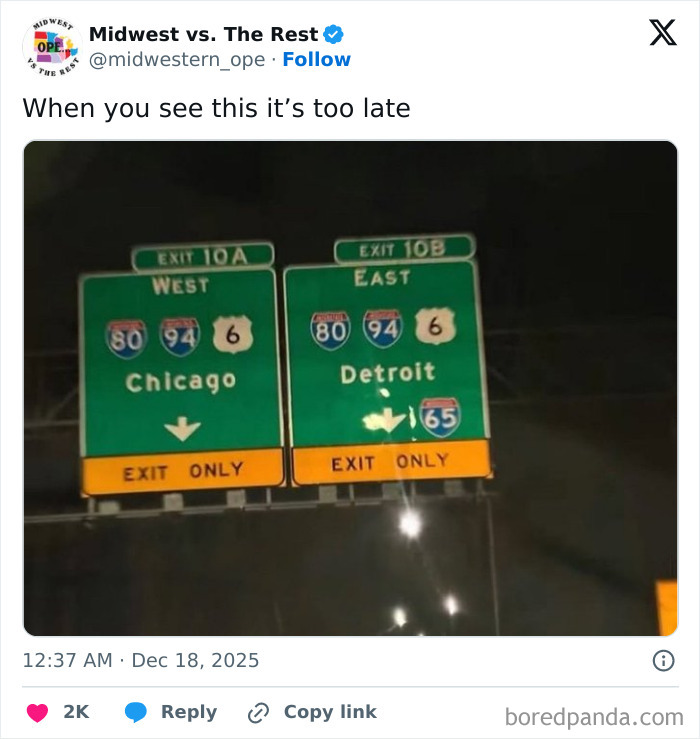 Highway exit signs for Chicago and Detroit at night, highlighting Midwest life with humor and corn craving vibes.