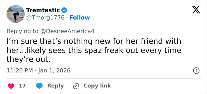 Screenshot of Twitter reply discussing a woman blocking tourist&rsquo;s shot in a viral Red Rock Canyon incident.