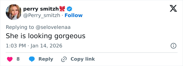 Screenshot of a Twitter reply praising Kylie Jenner’s appearance amid debate over her Golden Globes seat photo.