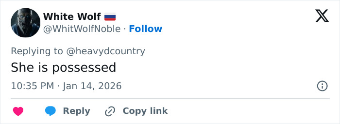 Tweet by user White Wolf replying to @heavydcountry, stating she is possessed, timestamped 10:35 PM Jan 14, 2026.