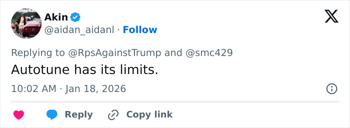 Tweet from user Akin replying critically about autotune in response to Lara Trump dance moves in new music video.