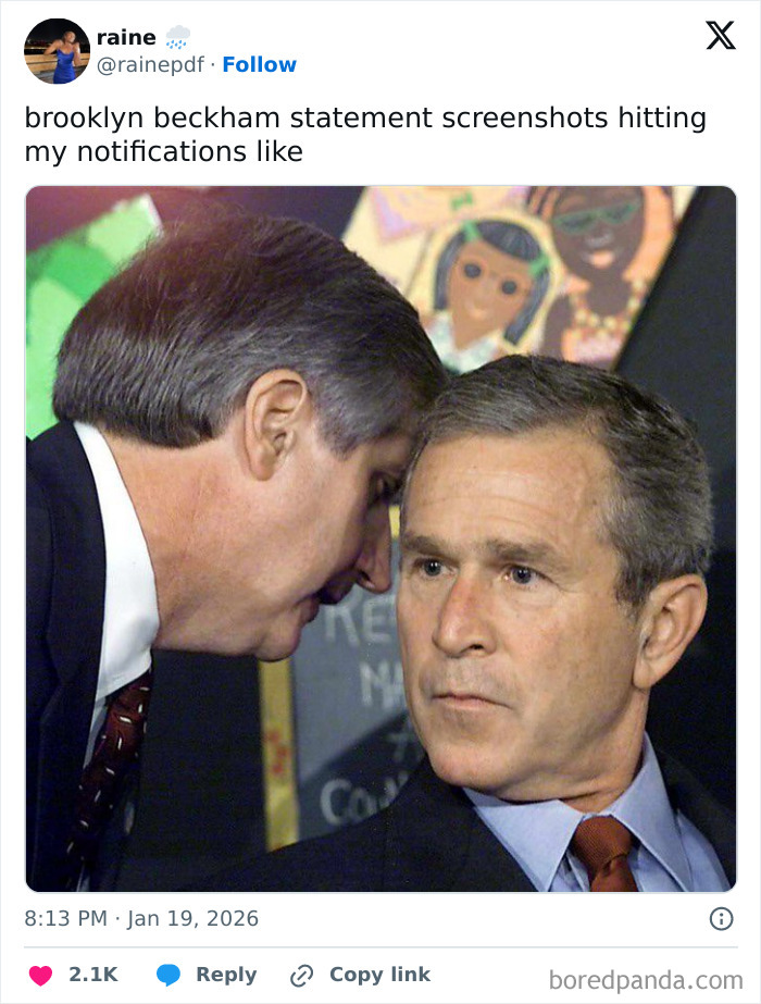 Two men in suits whispering with serious expressions, representing Victoria Beckham stealing the spotlight meme reaction.