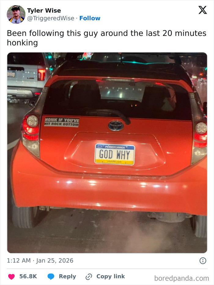 Orange car with a Pennsylvania license plate reading GOD WHY and a humorous bumper sticker, showcasing internet funny moments.