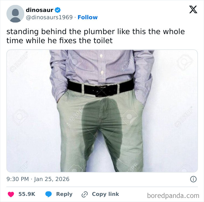 Man with wet stain on pants standing behind plumber, a humorous moment from internet posts in January.