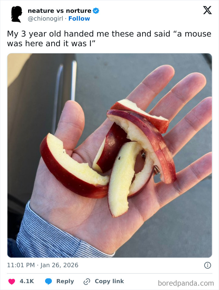 Hand holding several red apple peels arranged humorously, showcasing moments when the internet got way too funny.