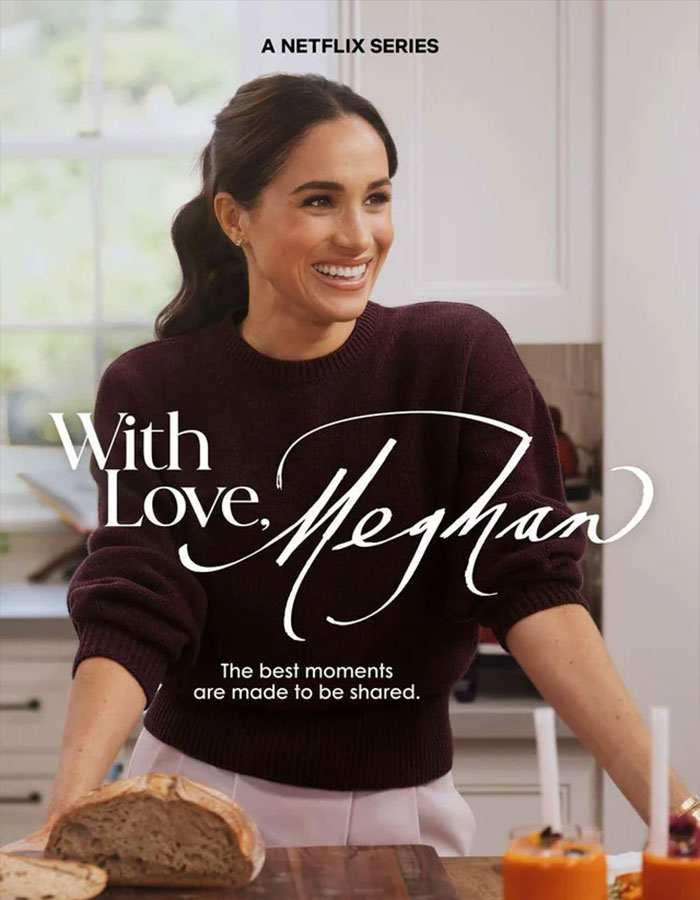 Meghan Markle smiling in a kitchen setting, promoting a Netflix series, highlighting alleged rift with mom Doria theories.