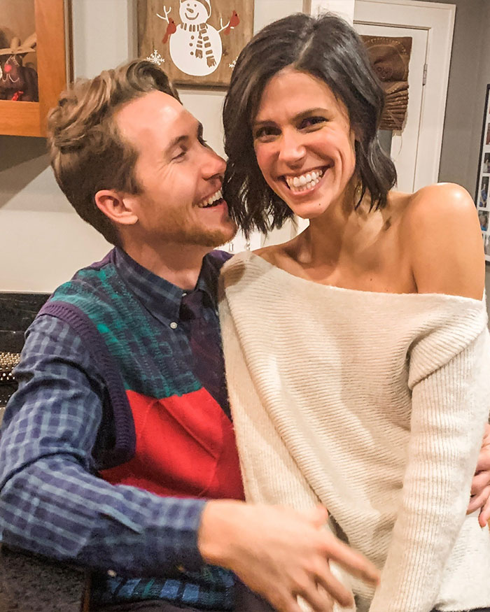 Happy couple smiling together indoors, related to Ohio dentist and wife twisted homicide possible motive.