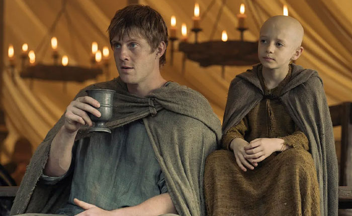 Peter Claffey and child star Dexter Sol Ansell in medieval costumes during a humorous AKOTSK interview scene.