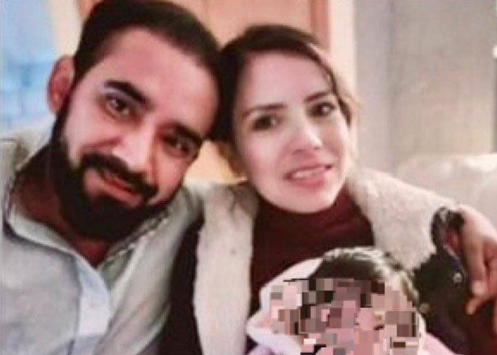 Father changing gender identity to avoid child support, pictured with partner and child in a cozy home setting