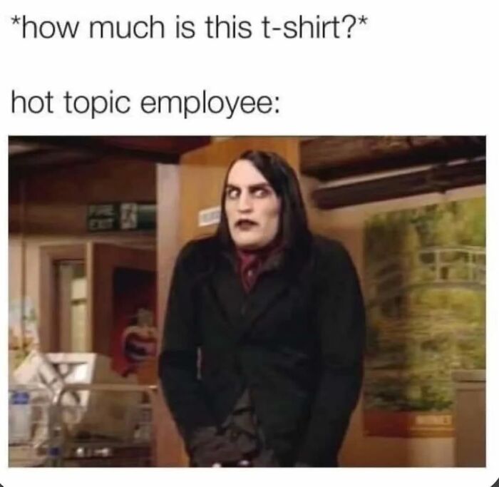 Person in dark clothing and makeup making a confused face, illustrating funny memes that make absolutely no sense and somehow work.