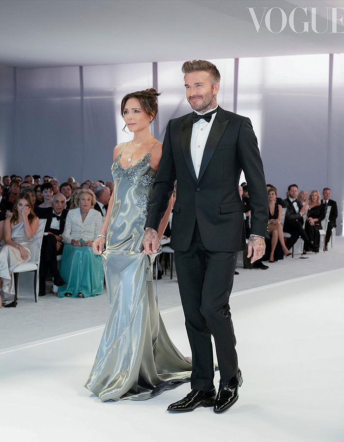 Victoria Beckham and David Beckham dressed elegantly at a wedding guest event revealing new dance details. Victoria Beckham and David Beckham dressed elegantly at a wedding guest event revealing new dance details.