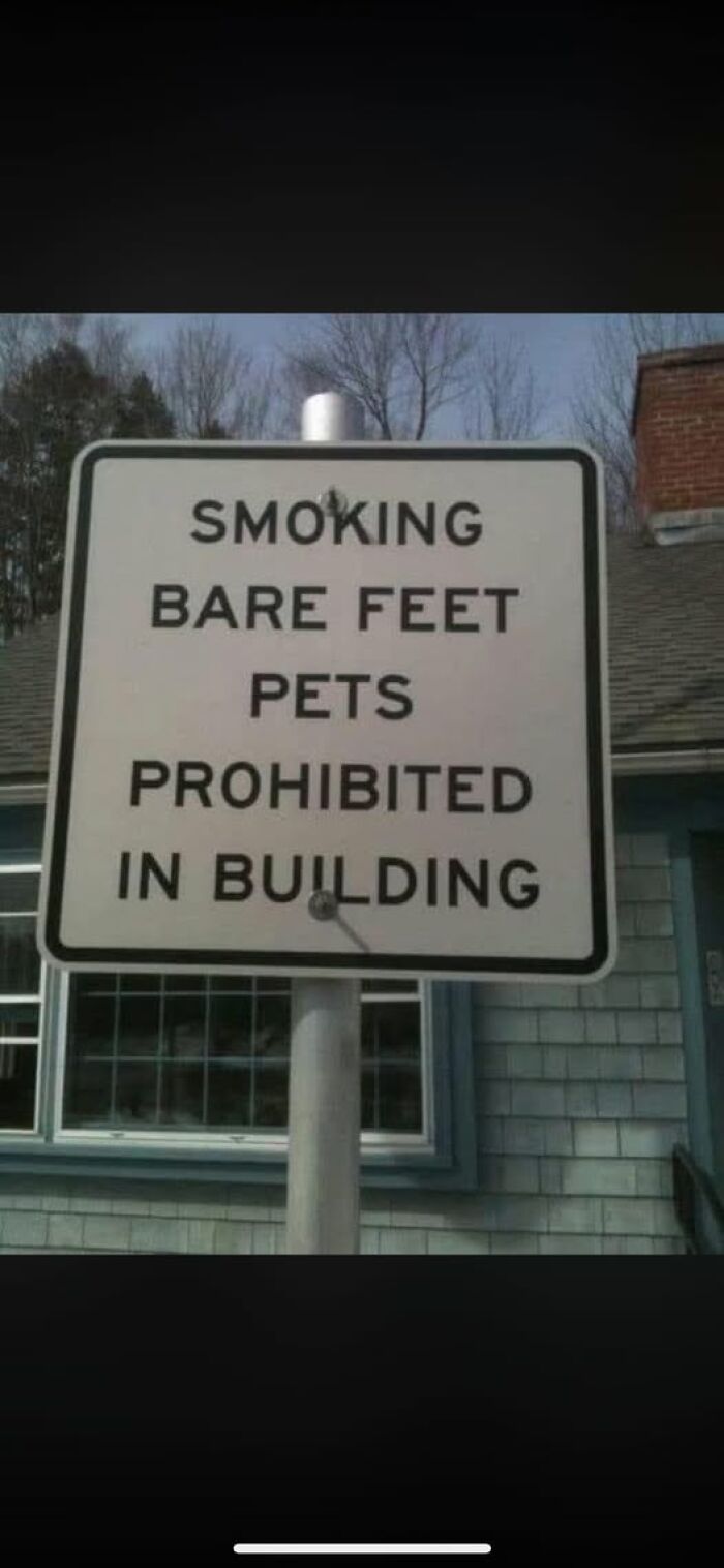 Confusing sign showing smoking bare feet pets prohibited in building, illustrating people breaking their brain trying to understand.
