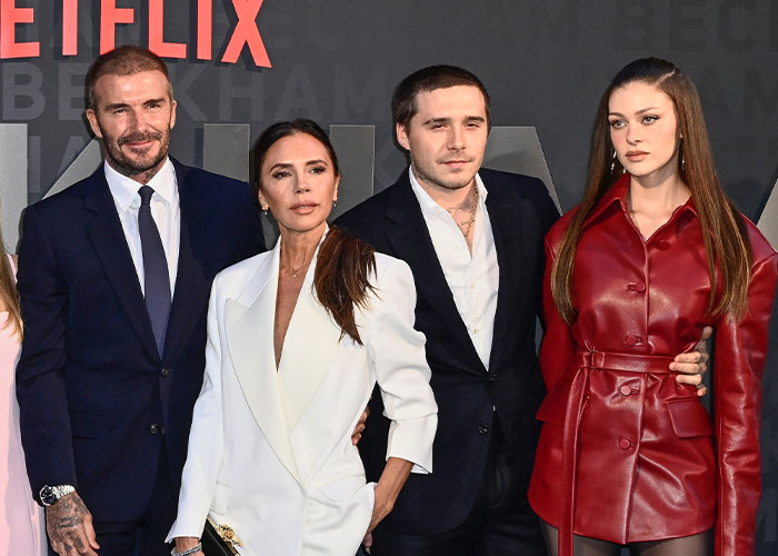 Victoria Beckham and Brooklyn Beckham pose with Nicola Peltz at a Netflix event, highlighting sister of Nicola Peltz's ex incident. Victoria Beckham and Brooklyn Beckham pose with Nicola Peltz at a Netflix event, highlighting sister of Nicola Peltz's ex incident.