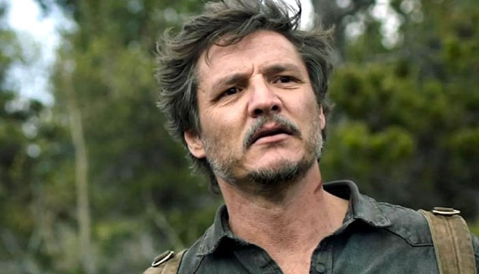 Man with tousled hair and stubble wearing a dark shirt outdoors, representing celebs who weren’t nepo babies.