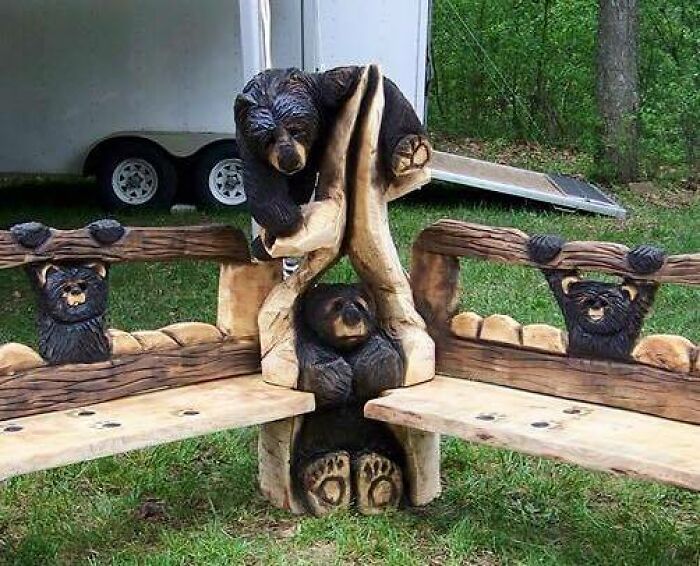 Woodworking projects featuring intricately carved bear sculptures integrated into a rustic outdoor bench design.