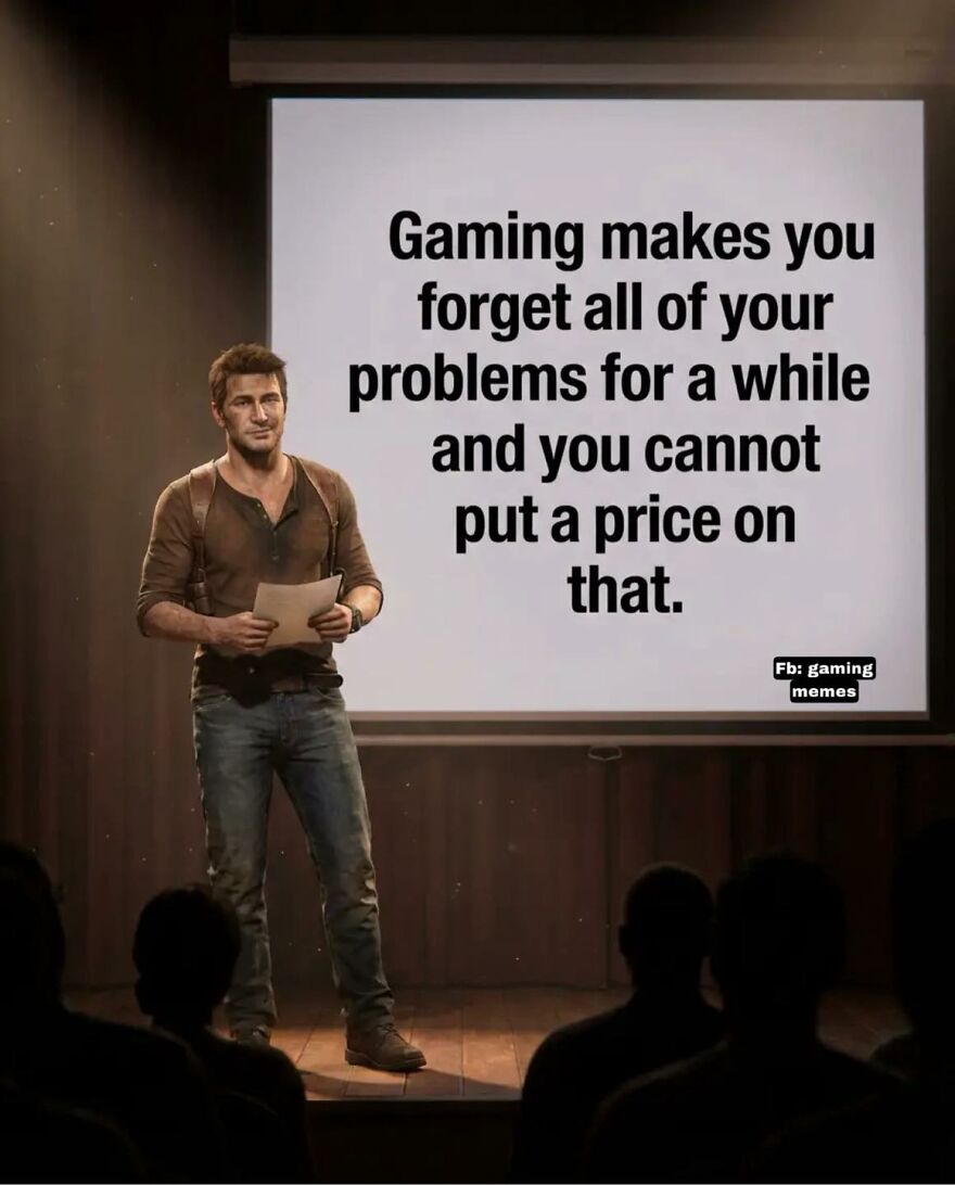 Man on stage holding paper with quote about gaming helping exhausted adults forget problems in gaming memes presentation.
