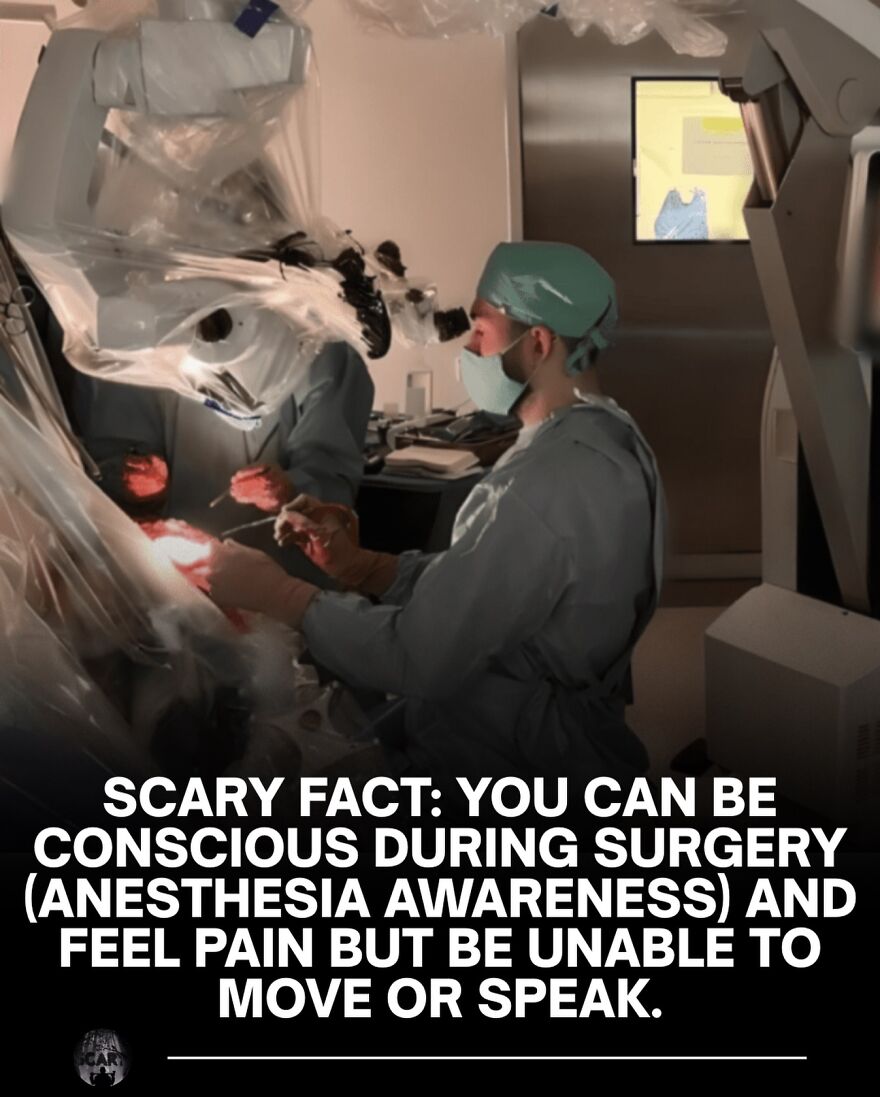 Surgeons performing operation under microscope, illustrating scary fact about anesthesia awareness and pain during surgery.