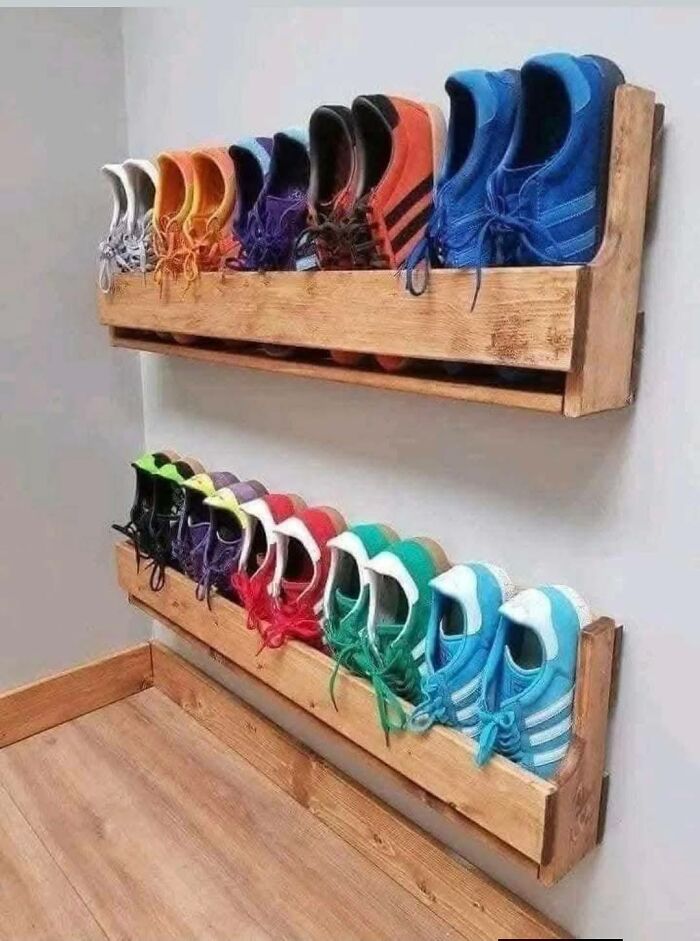 Woodworking projects showing a creative shoe rack made from wood, neatly organizing colorful sneakers on a wall.