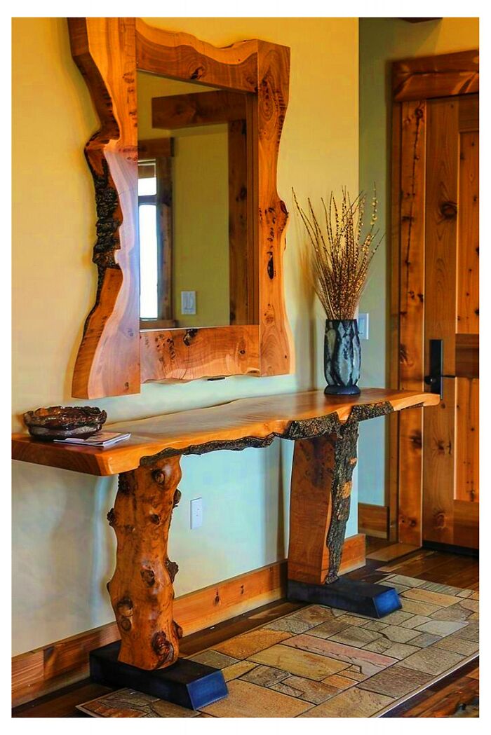 Rustic woodworking projects featuring a natural live edge wood table and matching mirror with raw wood textures.