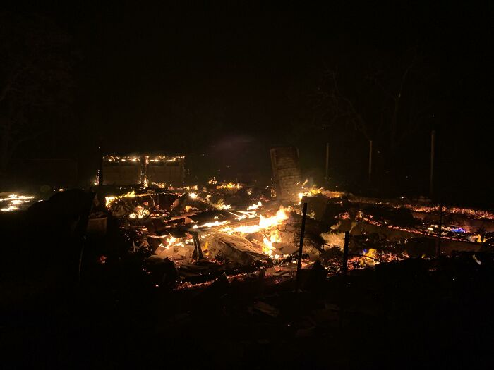 woke up expecting normal day, house in smoldering ruins with flames at night