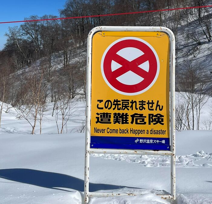 Japanese sign in snow with funny English translation showing Japan getting completely lost while translating to English.