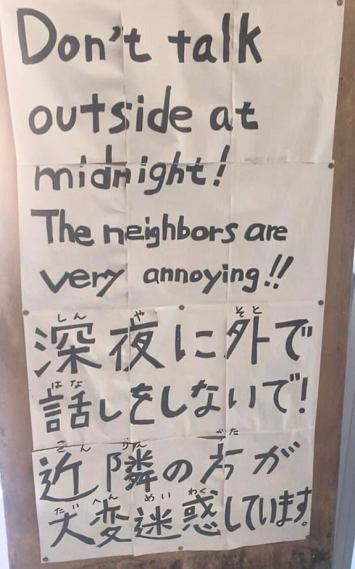 Sign showing a humorous English translation from Japanese warning not to talk outside at midnight due to annoying neighbors.
