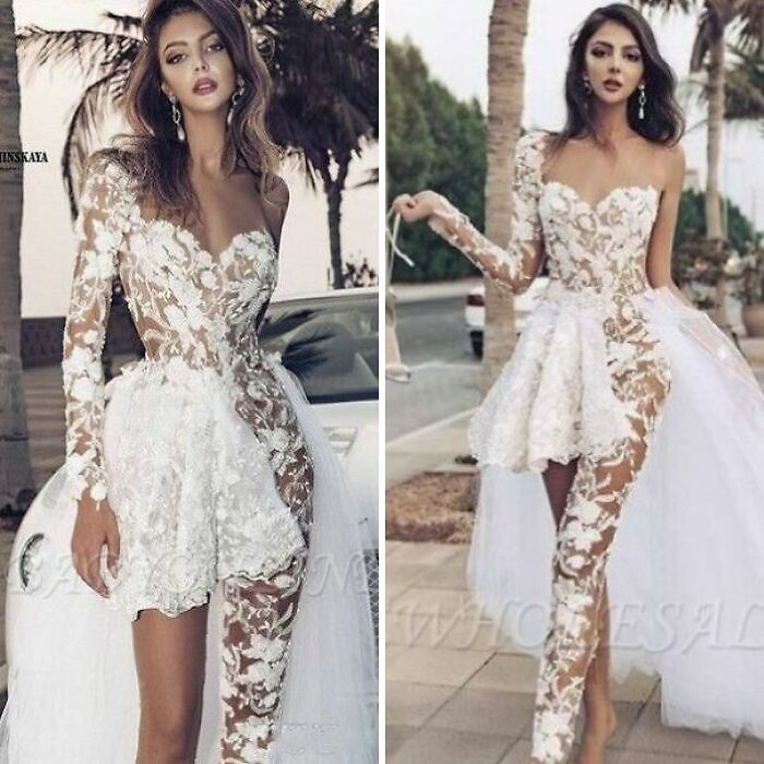 Model wearing a sheer, floral lace wedding dress with a high slit and long train in an outdoor setting.