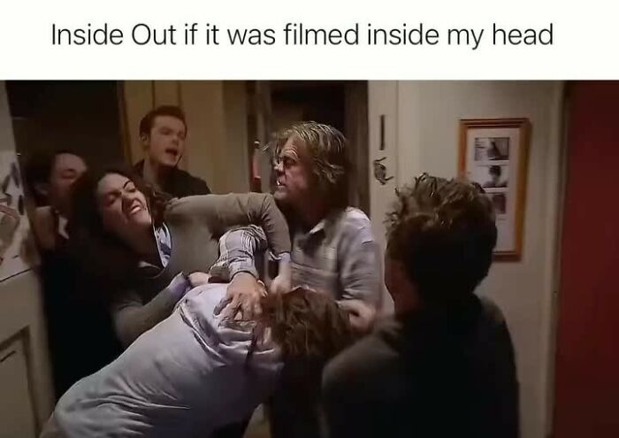 Group of people in a chaotic fight scene indoors illustrating humor as a coping mechanism in real life emotions.