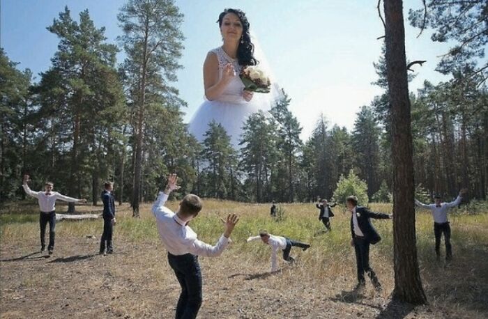 Bride's giant head edited above groomsmen in a forest, creating humorous and awkward wedding photo moment.