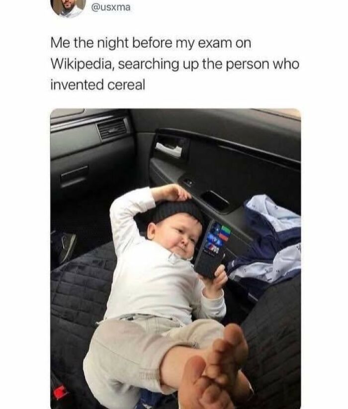 Child lying in car seat, looking at phone, with humorous text about last-minute exam Wikipedia search, showcasing meme humor.