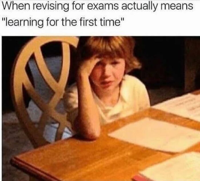 Child looking frustrated at a table with papers, representing humor and memes about healthcare being expensive and stressful.