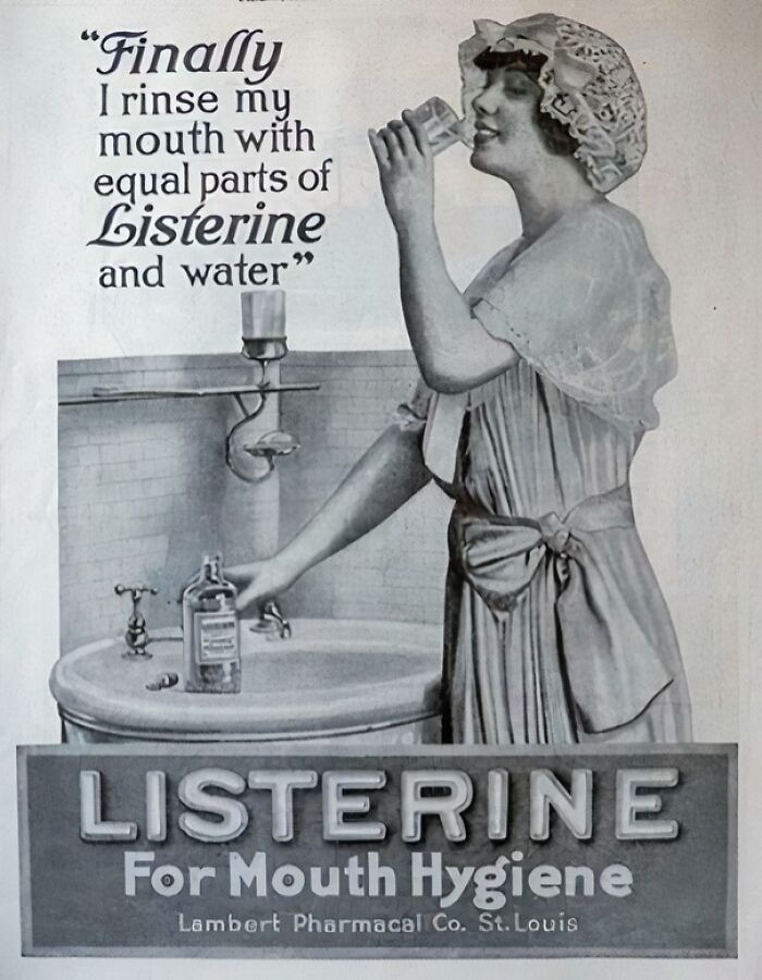Vintage women’s ad showing a woman using Listerine mouthwash for oral hygiene in an early 20th-century bathroom setting.