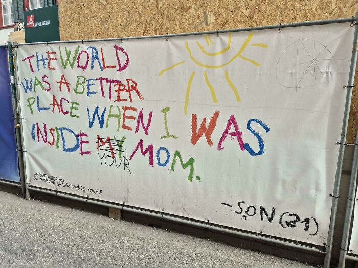 Colorful graffiti on a wall with a nostalgic message, capturing unhinged images that caught people off-guard.