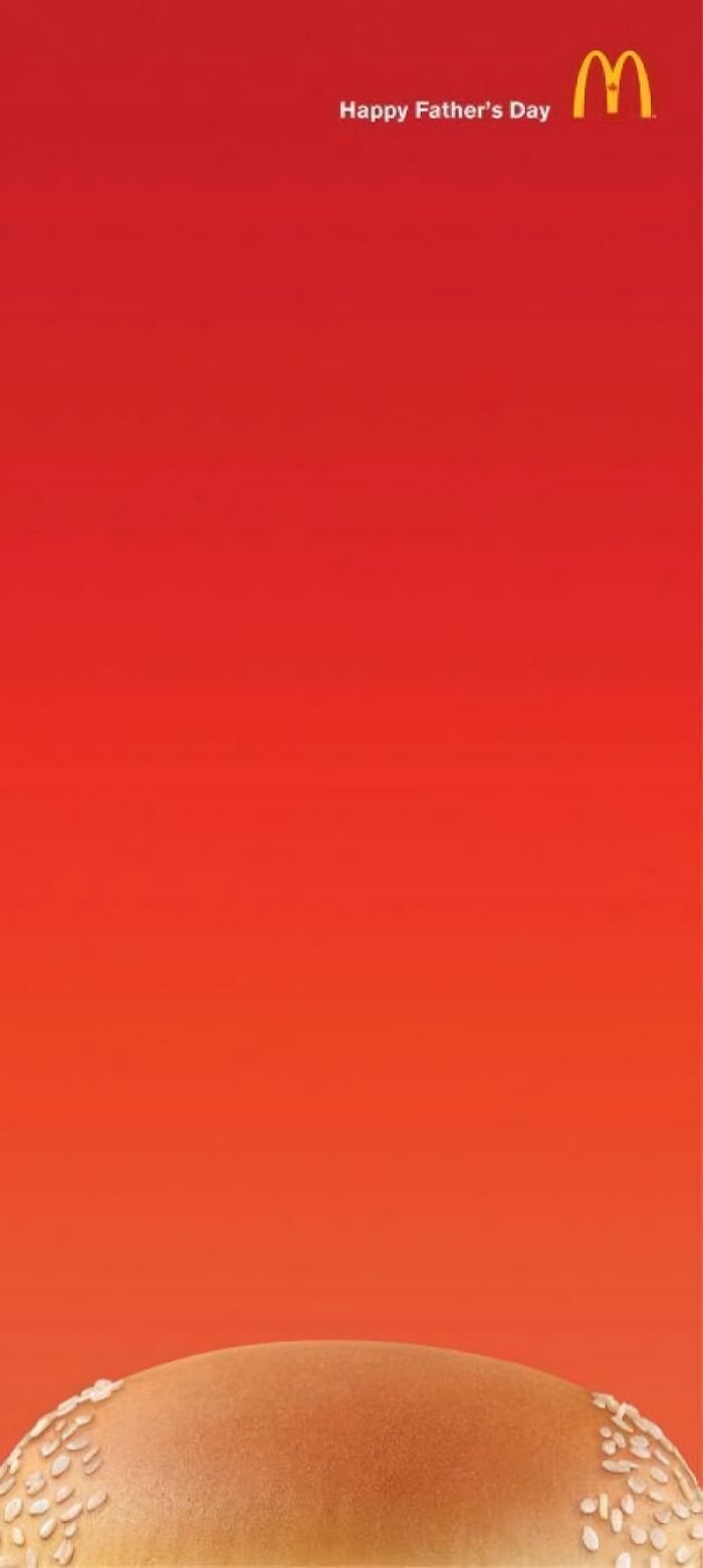 McDonald's print advertisement using humor and creativity with a burger bun shaped like a father's bald head on red background.