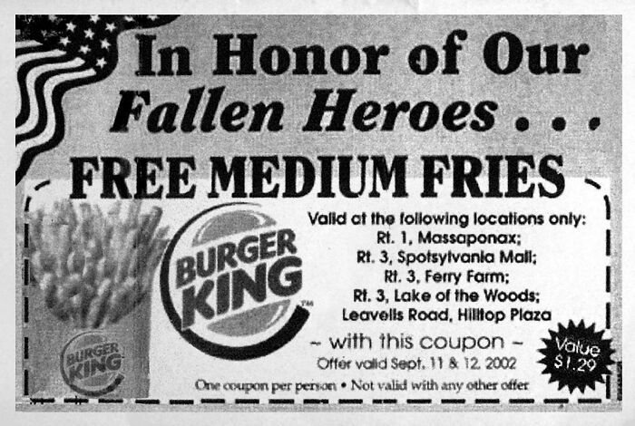 Vintage advertisements showing a Burger King coupon for free medium fries honoring fallen heroes in a black and white print ad.