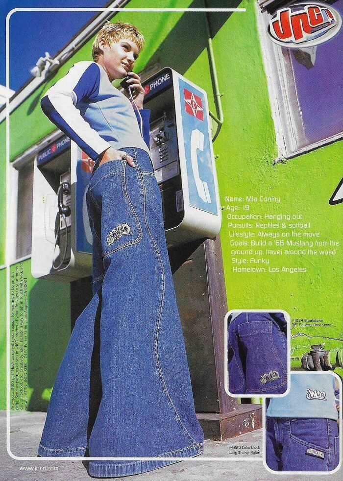 Young woman in wide-leg jeans using a vintage payphone, representing vintage advertisements fashion style from the 1970s.
