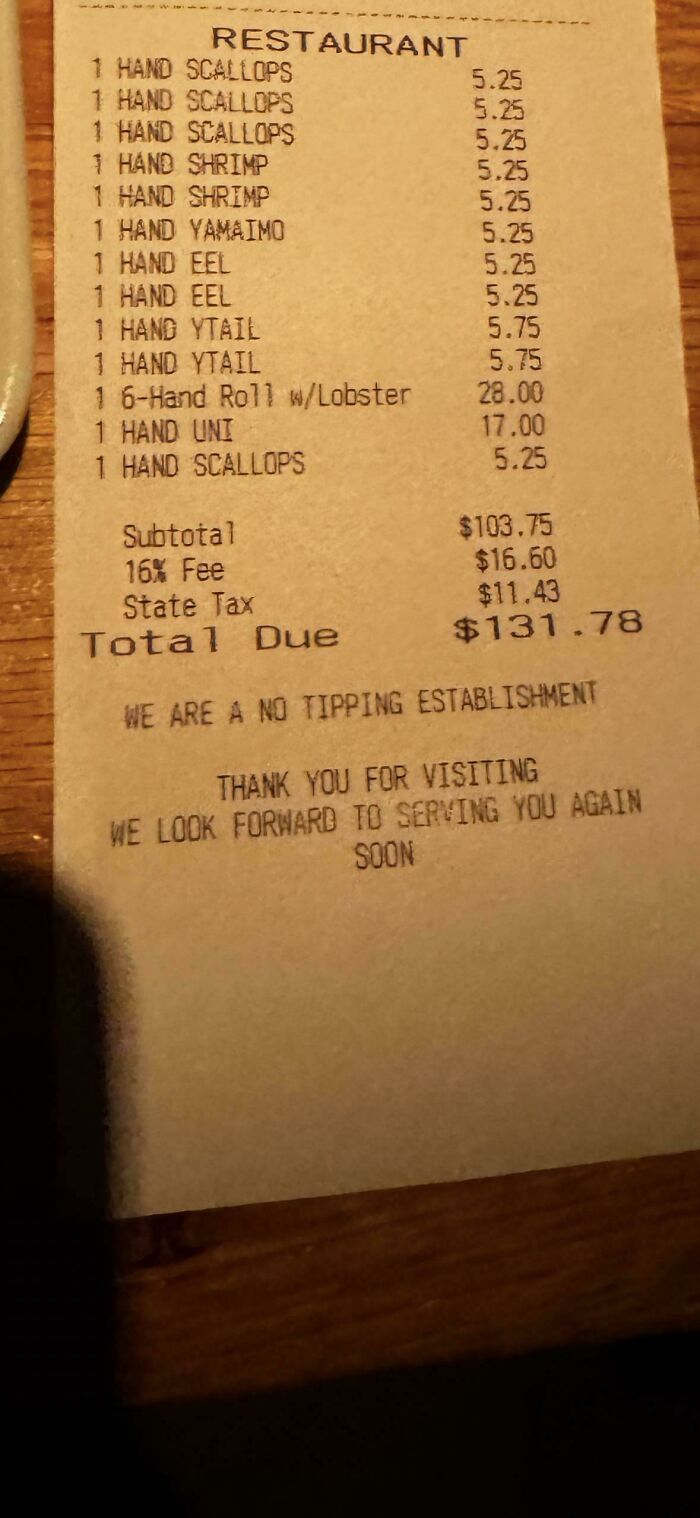 Restaurant receipt showing a no tipping policy highlighting normal practices in Europe that the US may find weird.